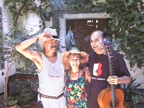 Freddie, Marianna, and Juan del Gastor in Evalina's courtyard