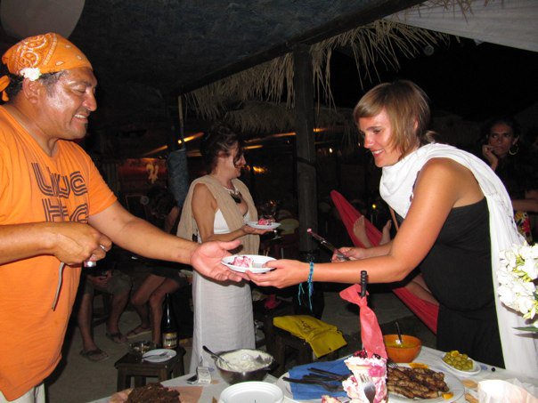 20100719 Hector and Sabina. Sabina serving Hector a piece of the cake he made